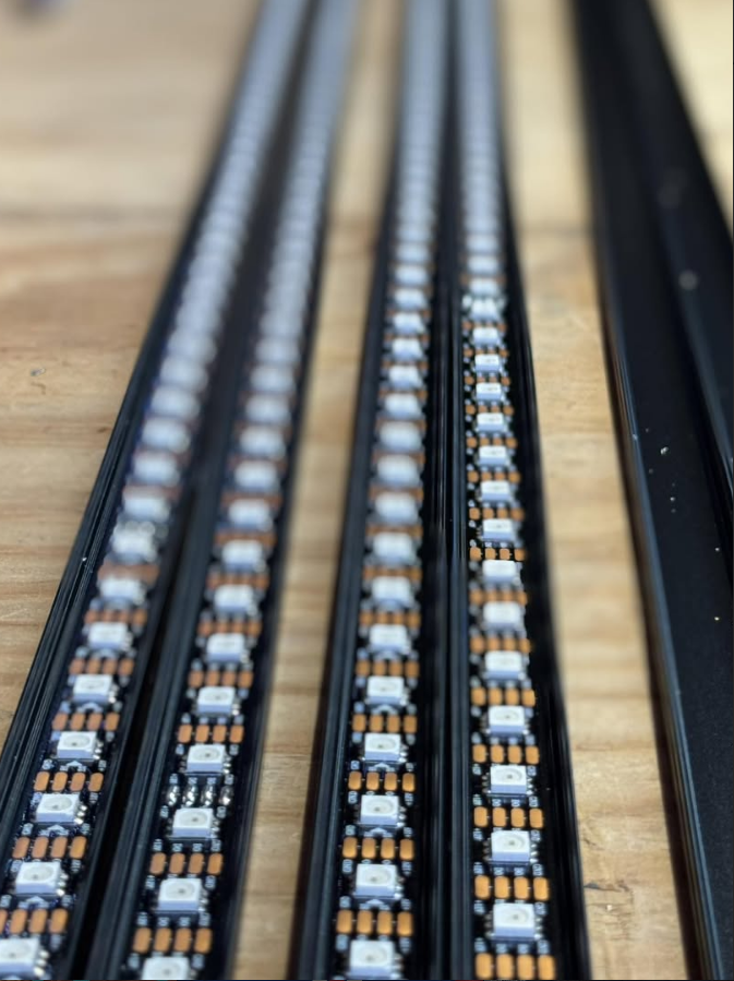 LED lighting strips fitted into black channels