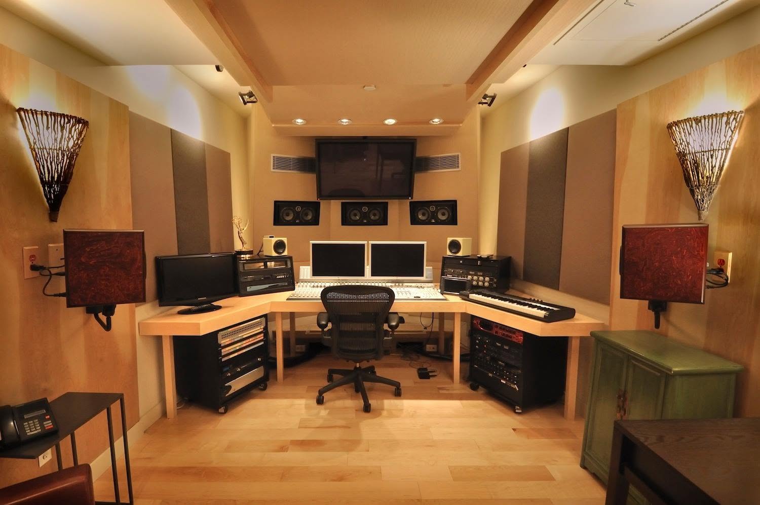Recording studio with mixing console, monitors and integrated equipment